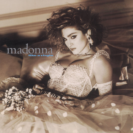 Album cover featuring Madonna in a lace top and skirt with text 'madonna like a virgin'.