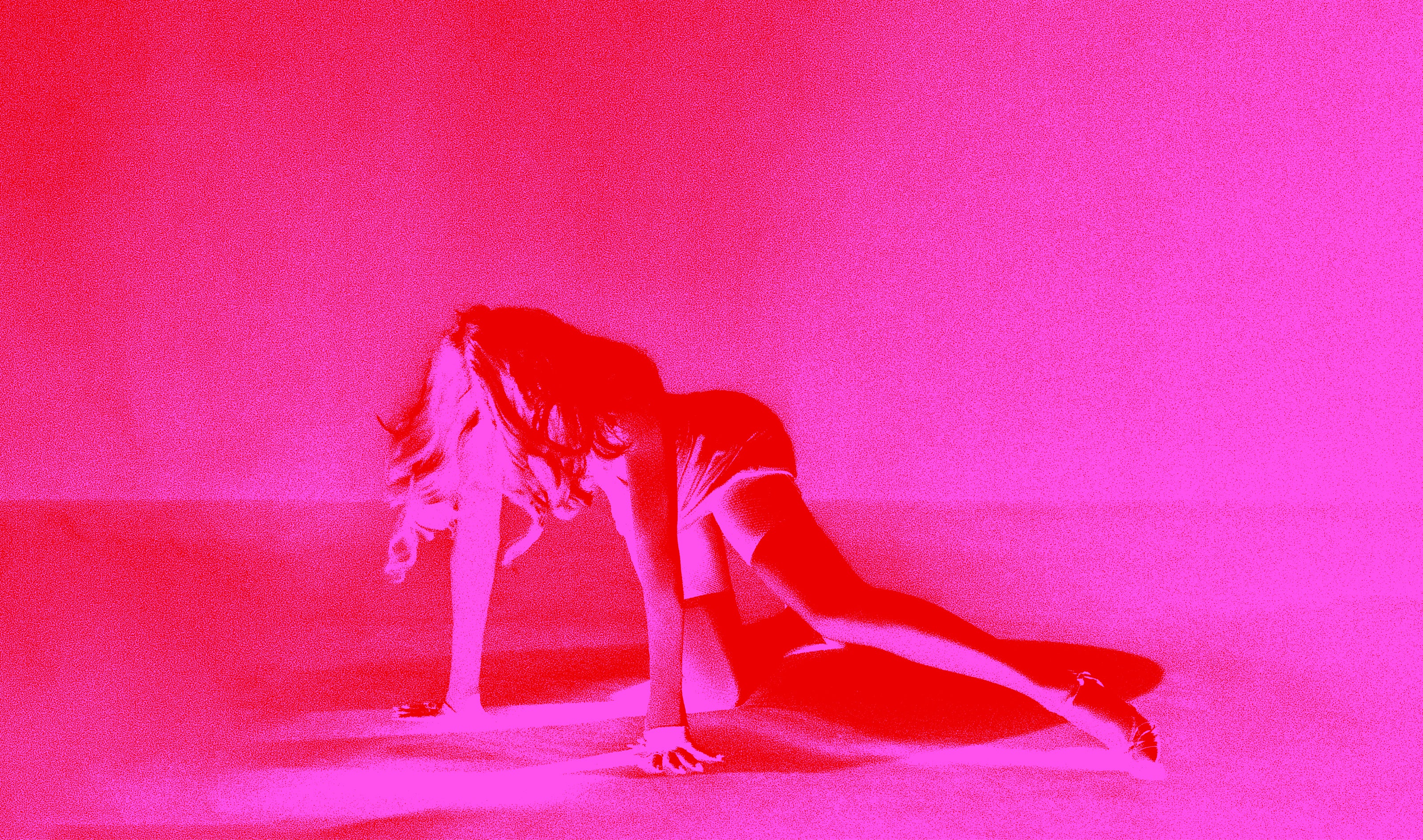 Store Banner of Madonna lying on the ground with a pink filter applied.